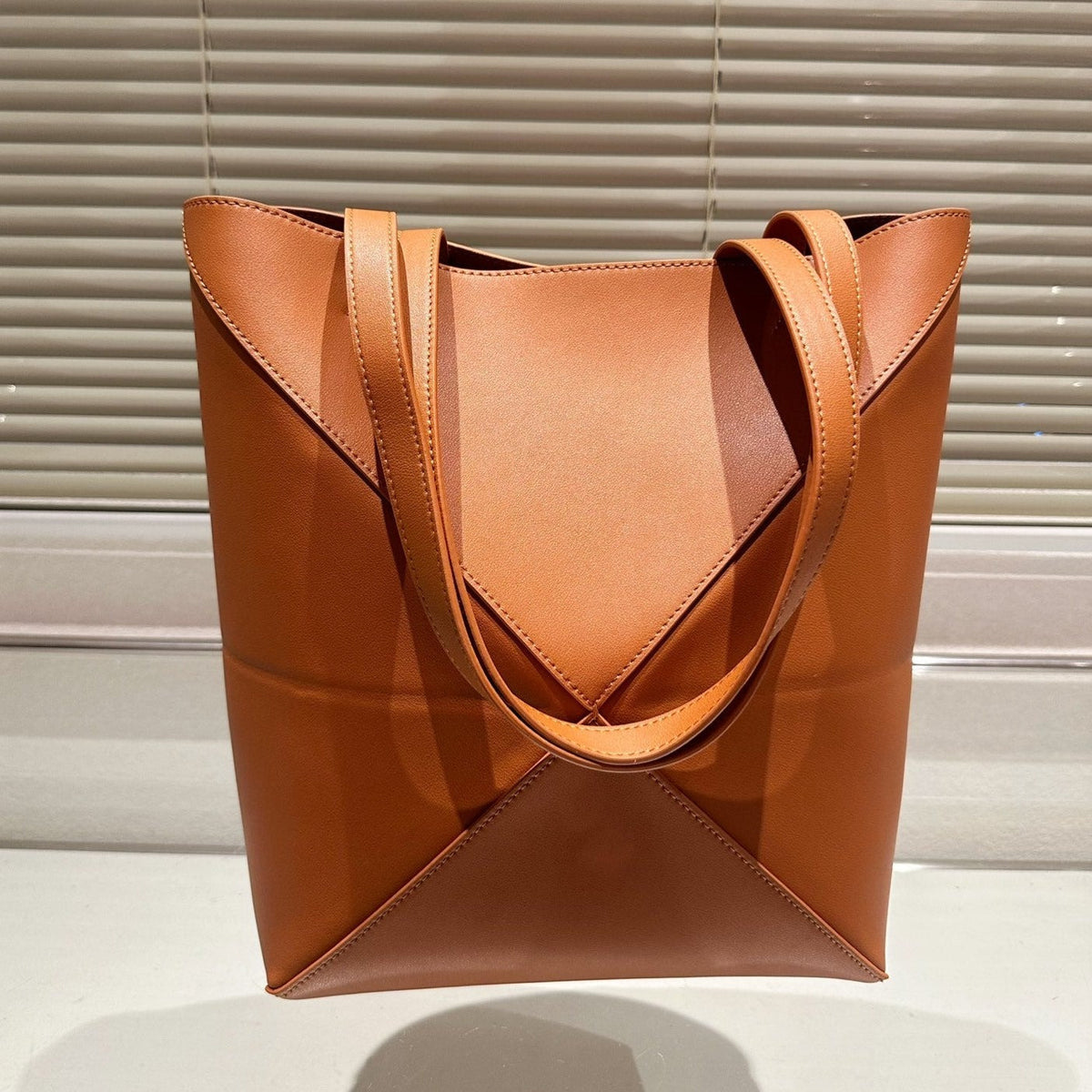 L   Head Cowhide Bucket Bag